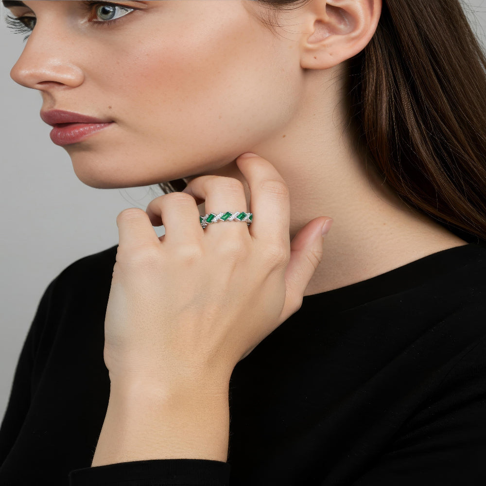 Aeterna Jewelry emerald-cut eternity ring worn by model in side profile view