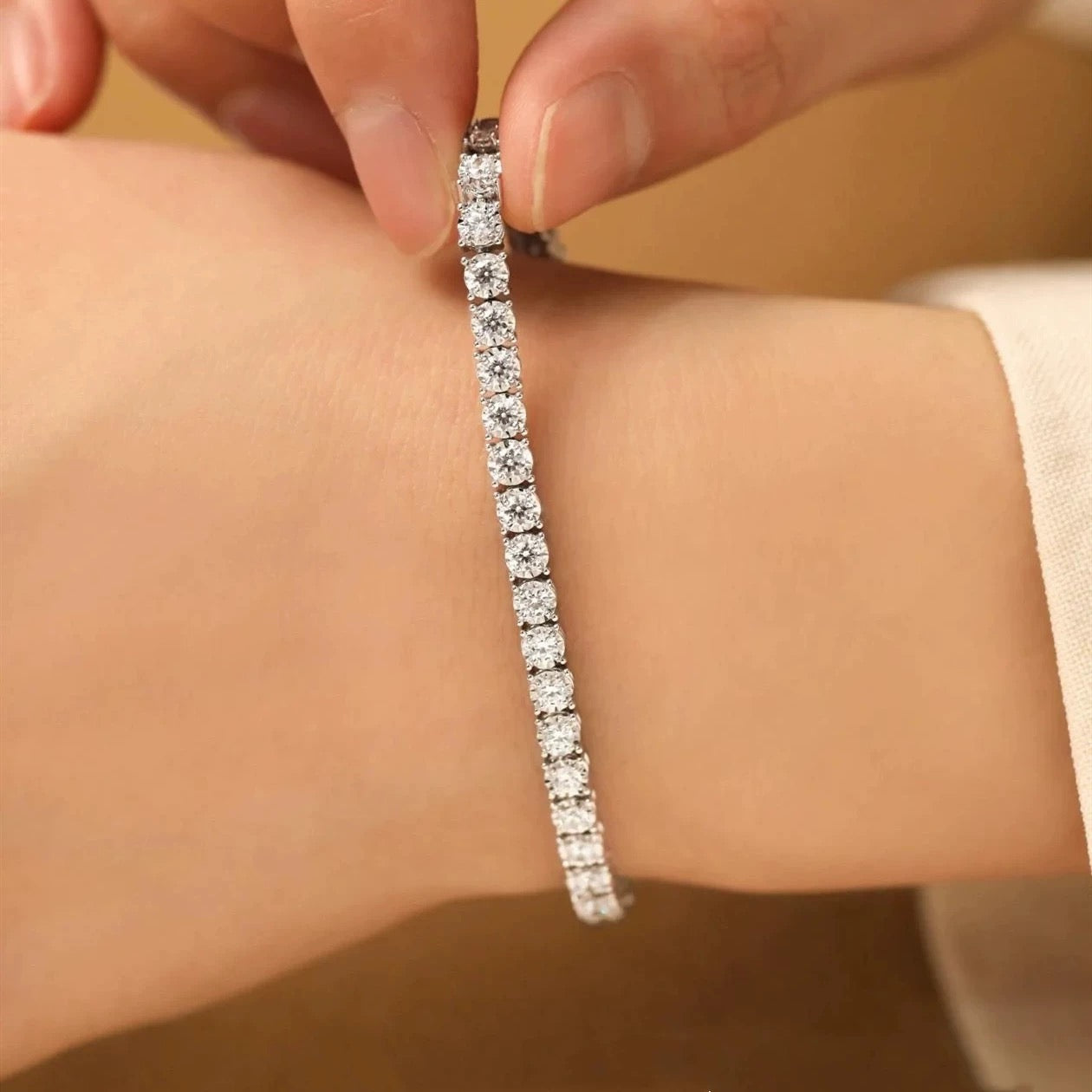 Close-up of Aeterna Jewelry tennis bracelet on wrist showing fine craftsmanship