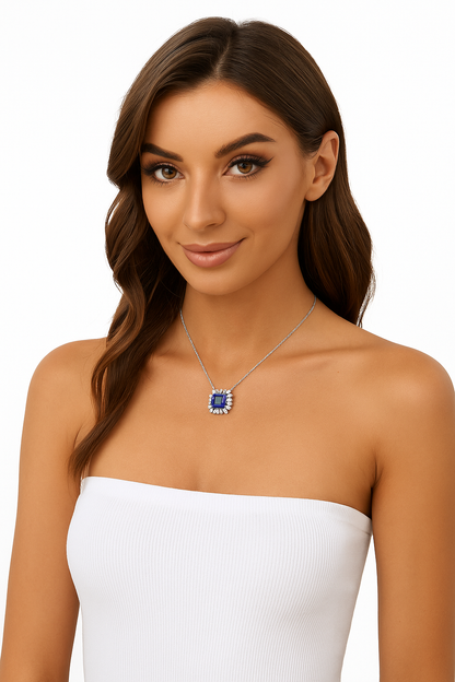 Model wearing sapphire and diamond necklace, minimalist British style portrait