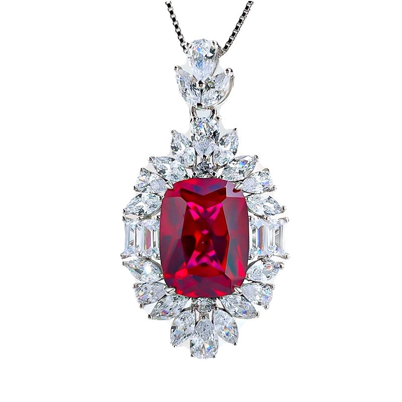 Aeterna Jewelry red ruby halo pendant necklace on white background