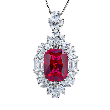 Aeterna Jewelry red ruby halo pendant necklace on white background