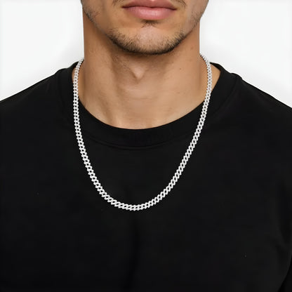 Aeterna Jewelry iced-out Cuban chain necklace worn by male model in black shirt